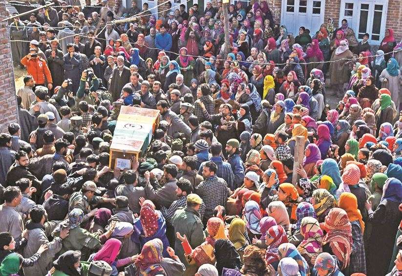 One last goodbye: Kashmiri villagers carry the body of Lance Naik Mohiuddin Rather who was killed in Thursday’s attack in Srinagar. (TOI photo by Bilal Bahadur)