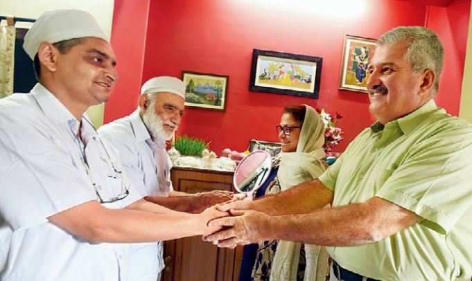 Members of a Parsi family greet each other on the occasion of Navroz on Monday