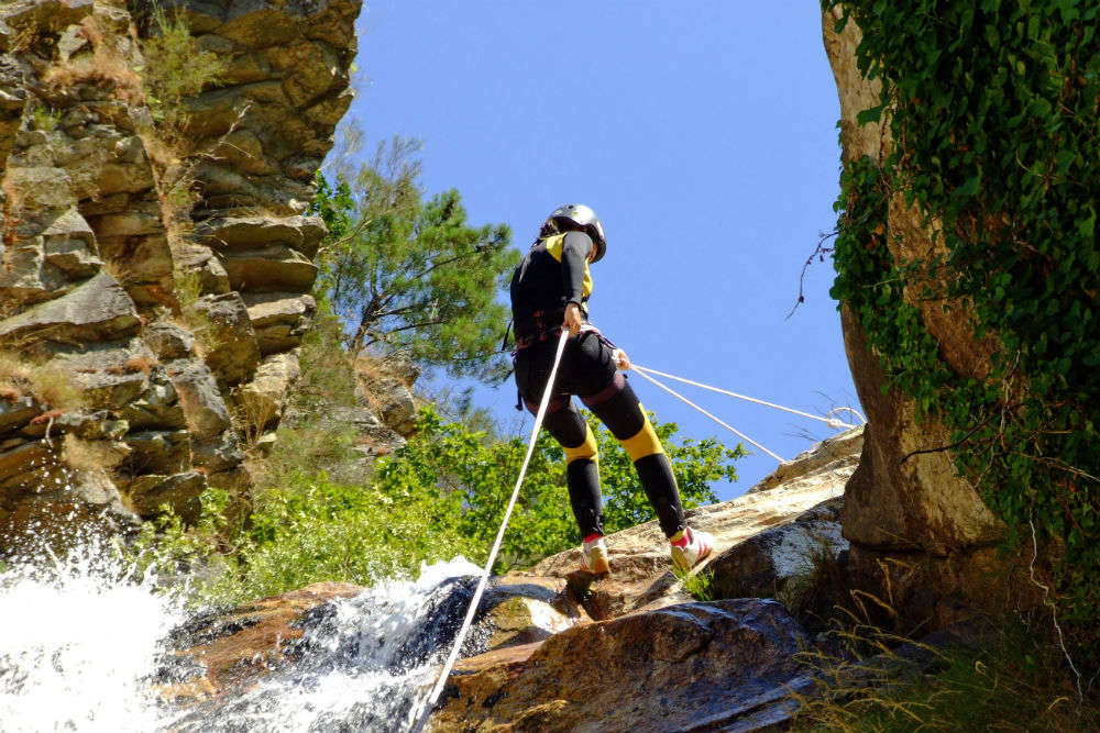 Waterfall rappelling