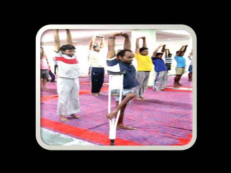 Students of Shakuntala Misra Rehabilitation University practise for the Yoga Day event