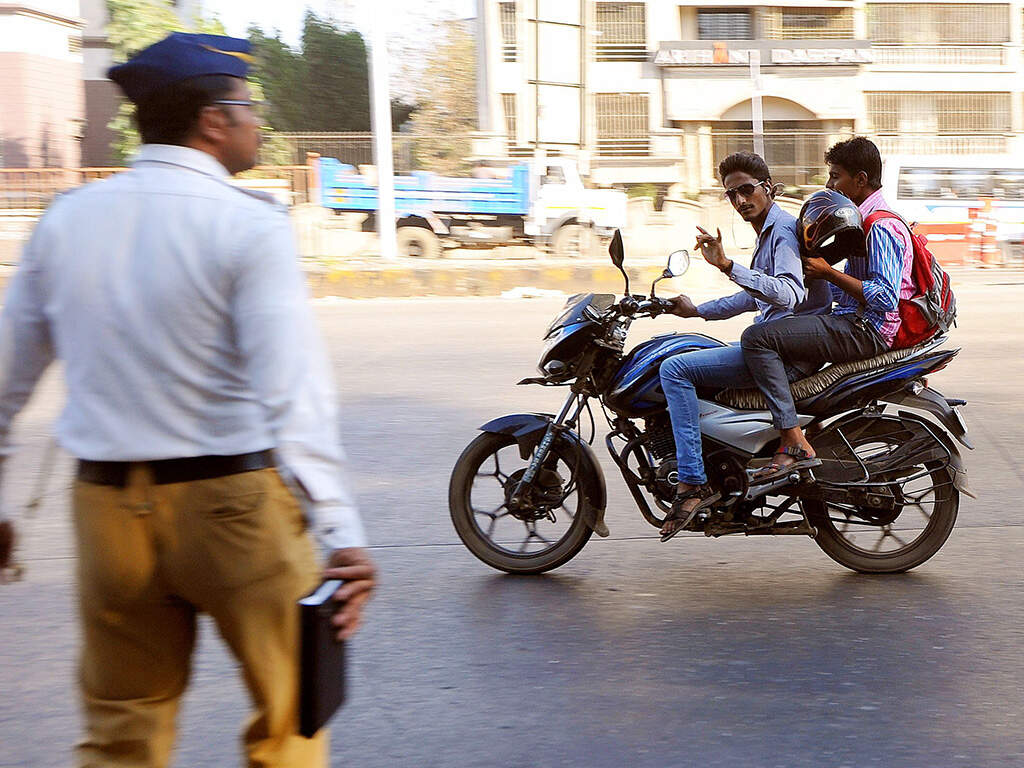 Where’s the helmet? With tees,cops make violators plug rule Chennai