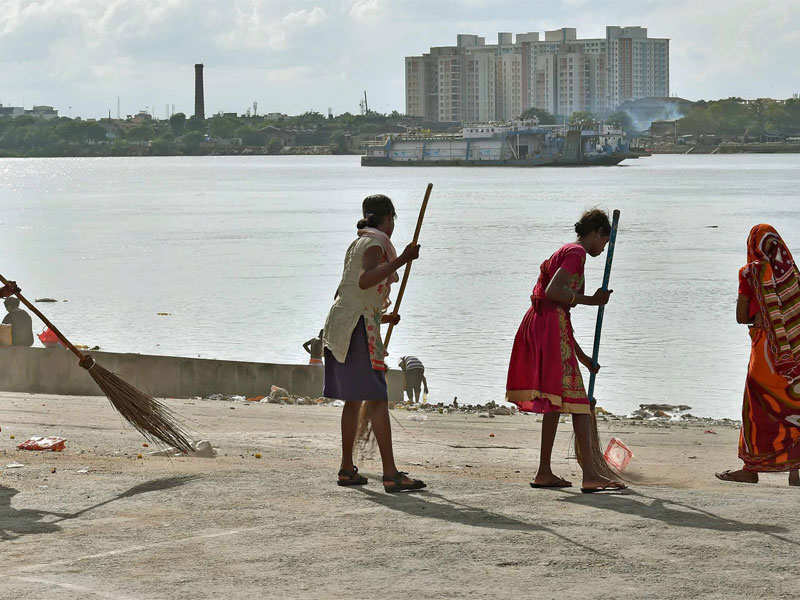Sweepers clean the bank of river Ganga in Kolkata. (File photo: PTI)