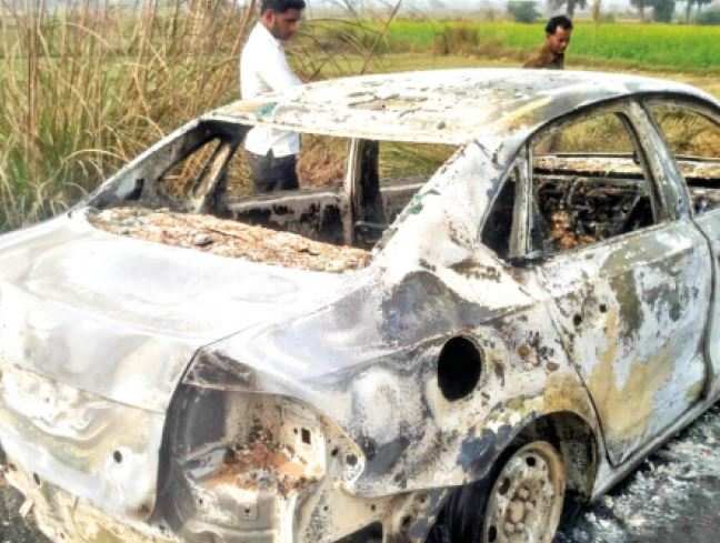 Charred body of Delhi builder found in car on UP highway - Times of India