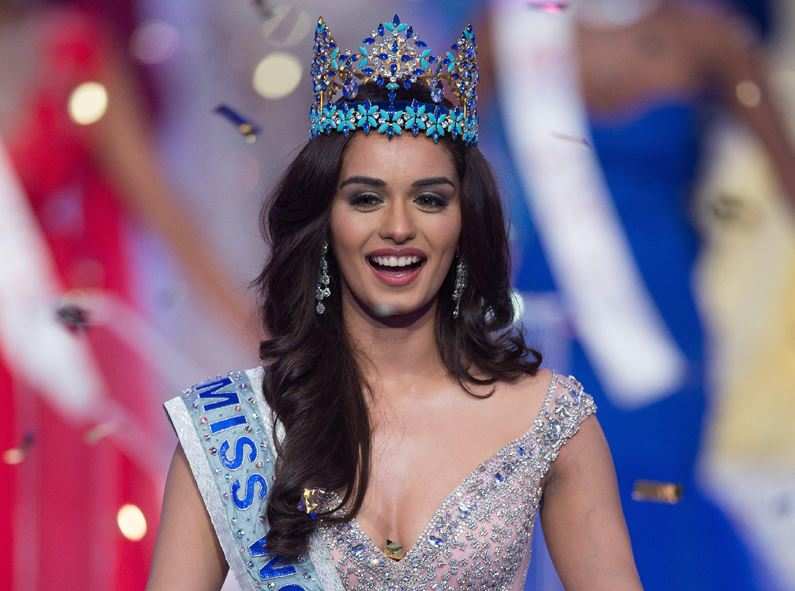 Miss India Manushi Chhilar smiles as she wins the 67th Miss World contest final in Sanya. (AFP photo)