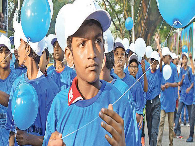 Children carry balloons in the ‘Walk for child rights’ organized by the KeSCPCR in Thiruvananthapuram on Saturday.