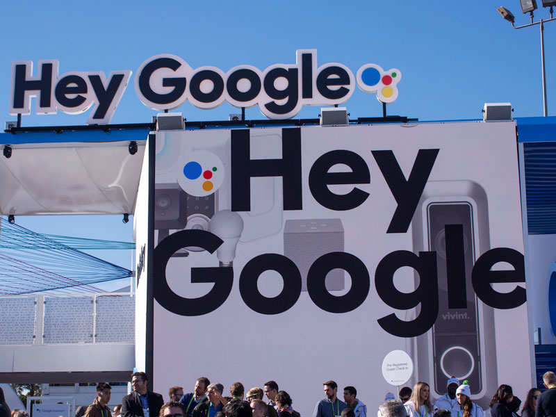 File photo shows people walking past the Google exhibit during CES 2018