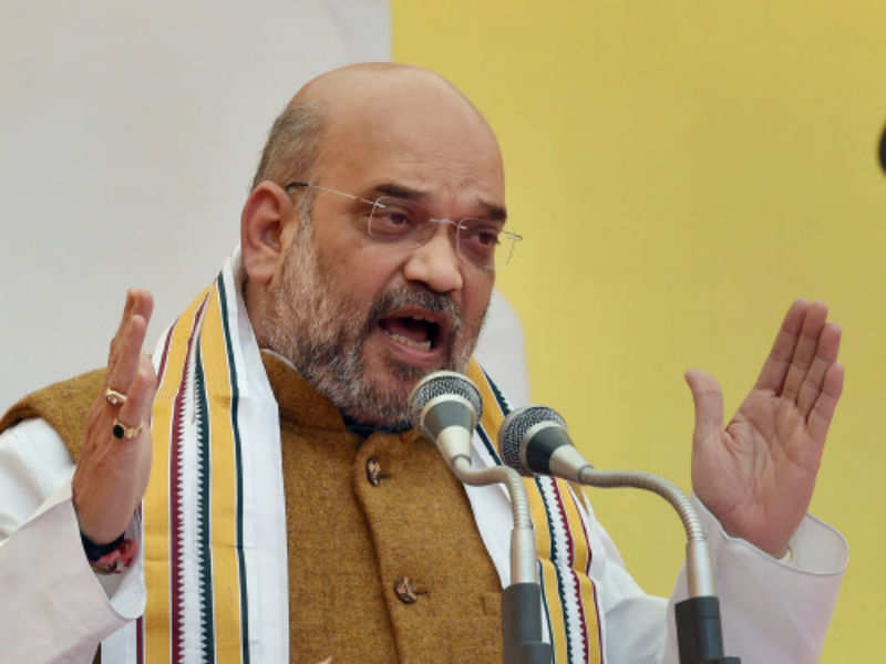 Amit Shah mimics Rahul Gandhi at Karnataka rally | India News - Times ...