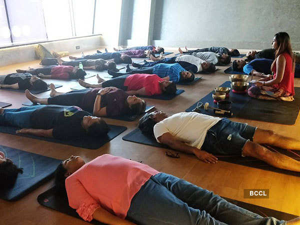 A sound yoga class in session in the city 