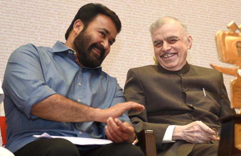 Actor Mohanlal with governor P Sathasivam during the award distribution function in Thiruvananthapuram on Wednesday