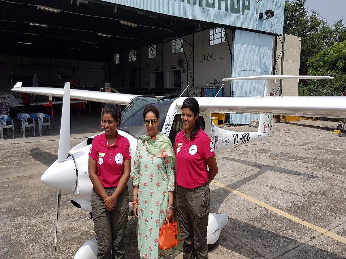 The woman pilots with former Union minister Preneet Kaur  (centre)