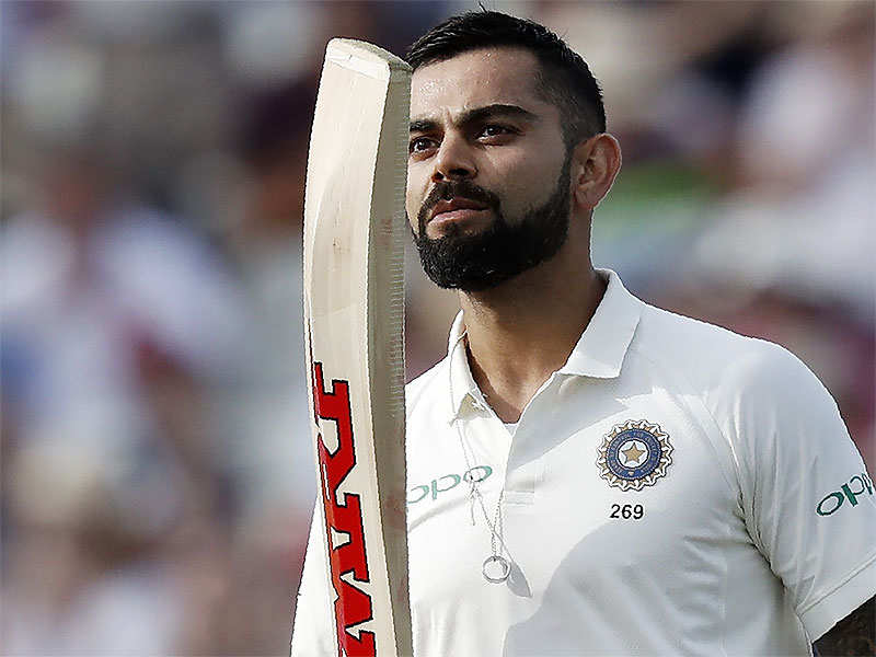 Virat Kohli celebrates scoring a century on the second day of the first Test against England. (AFP Photo)
