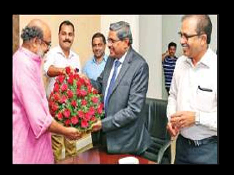 Finance minister T M Thomas Isaac with BPCL CMD D Rajkumar