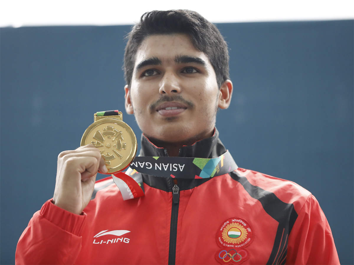 Gold medallist Saurabh Chaudhary poses after the 10m air pistol men's final. (AP Photo)