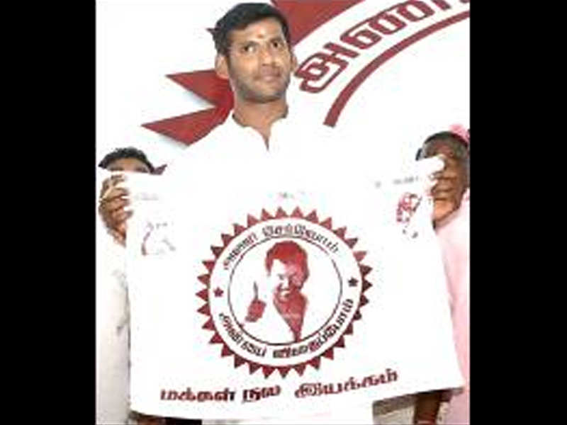 The actor displays a flag of Vishal Makkal Nala Iyakkam