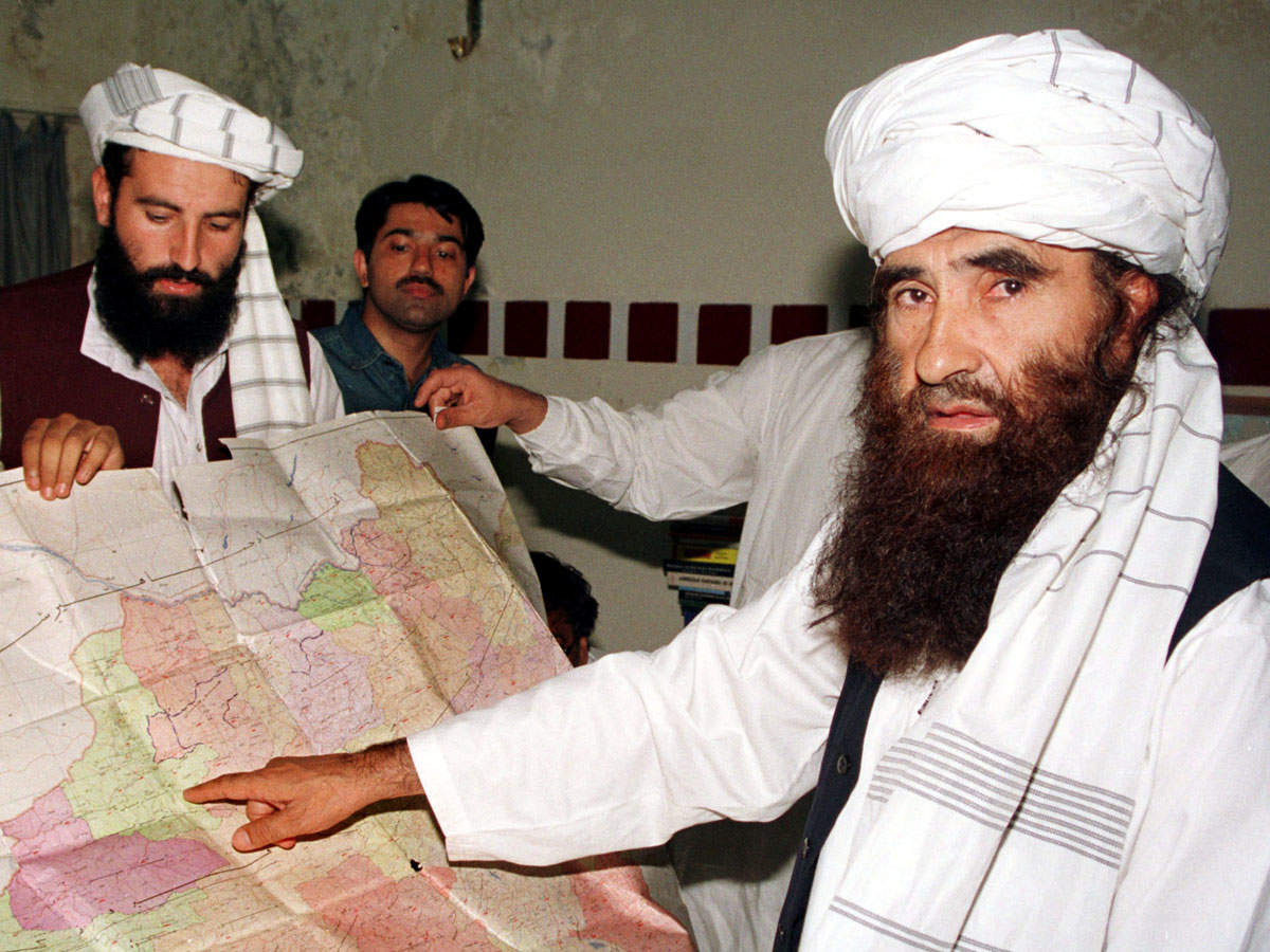 In this file photo, Jalaluddin Haqqani points to a map of Afghanistan during a visit to Islamabad. (Reuters)