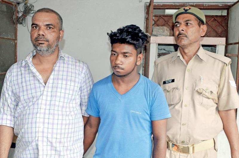 Gulab Singh (L) was arrested along with his 18-year-old son Rohit