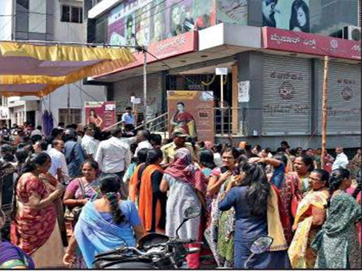 ALL-TIME FAVOURITE: Thousands of women queued up at the Karnataka Silk Industries Corporation outlet in Mysuru from 5am