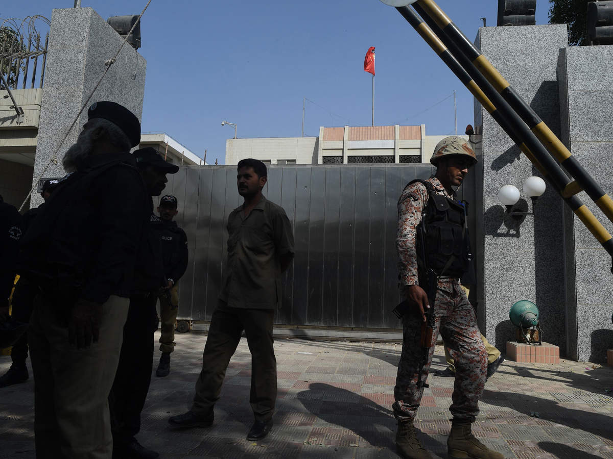 Pakistani Rangers gather in front of the gate of the Chinese consulate after the attack in Karachi. (AFP photo)