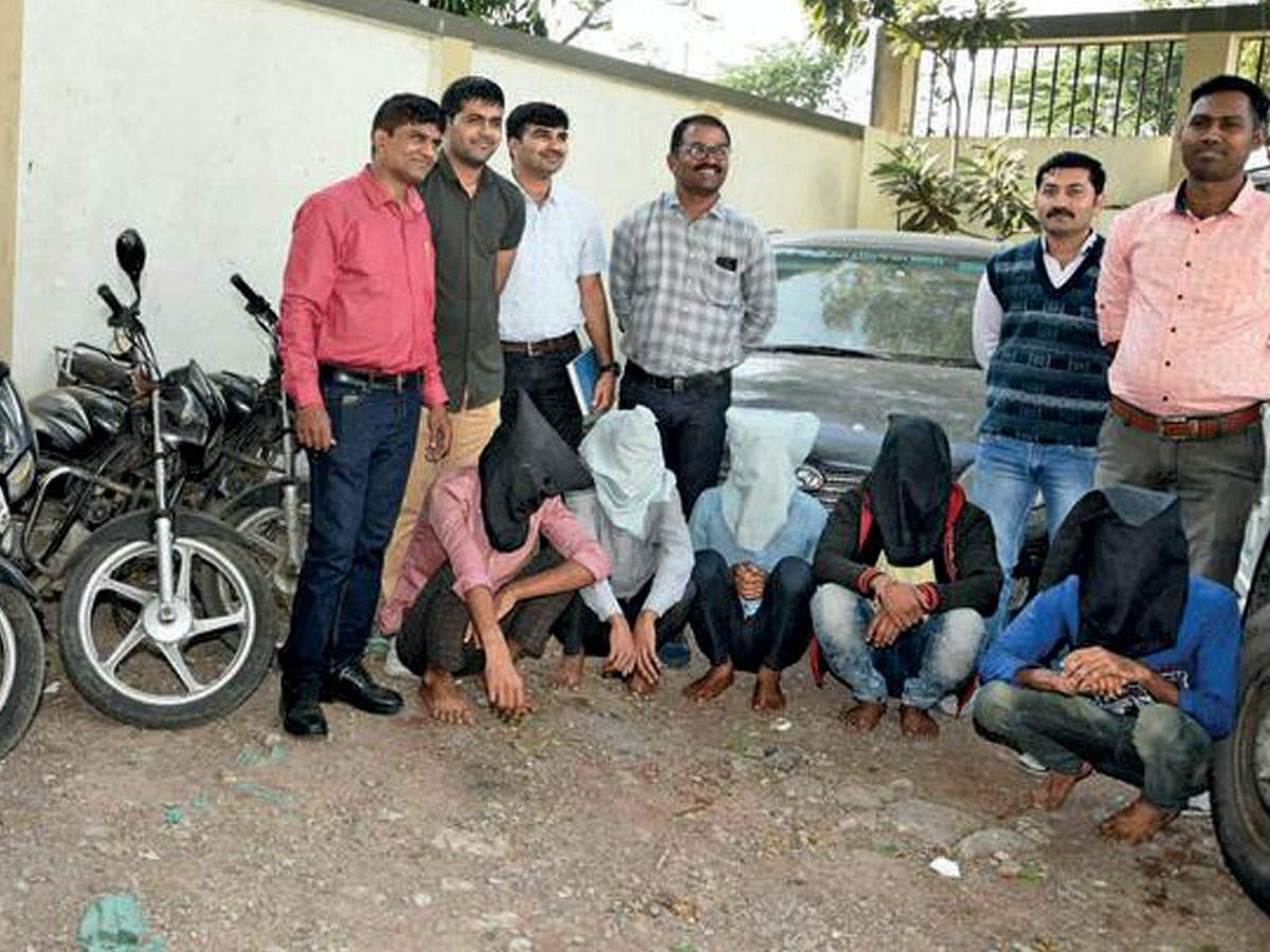The accused in custody with the seized vehicles