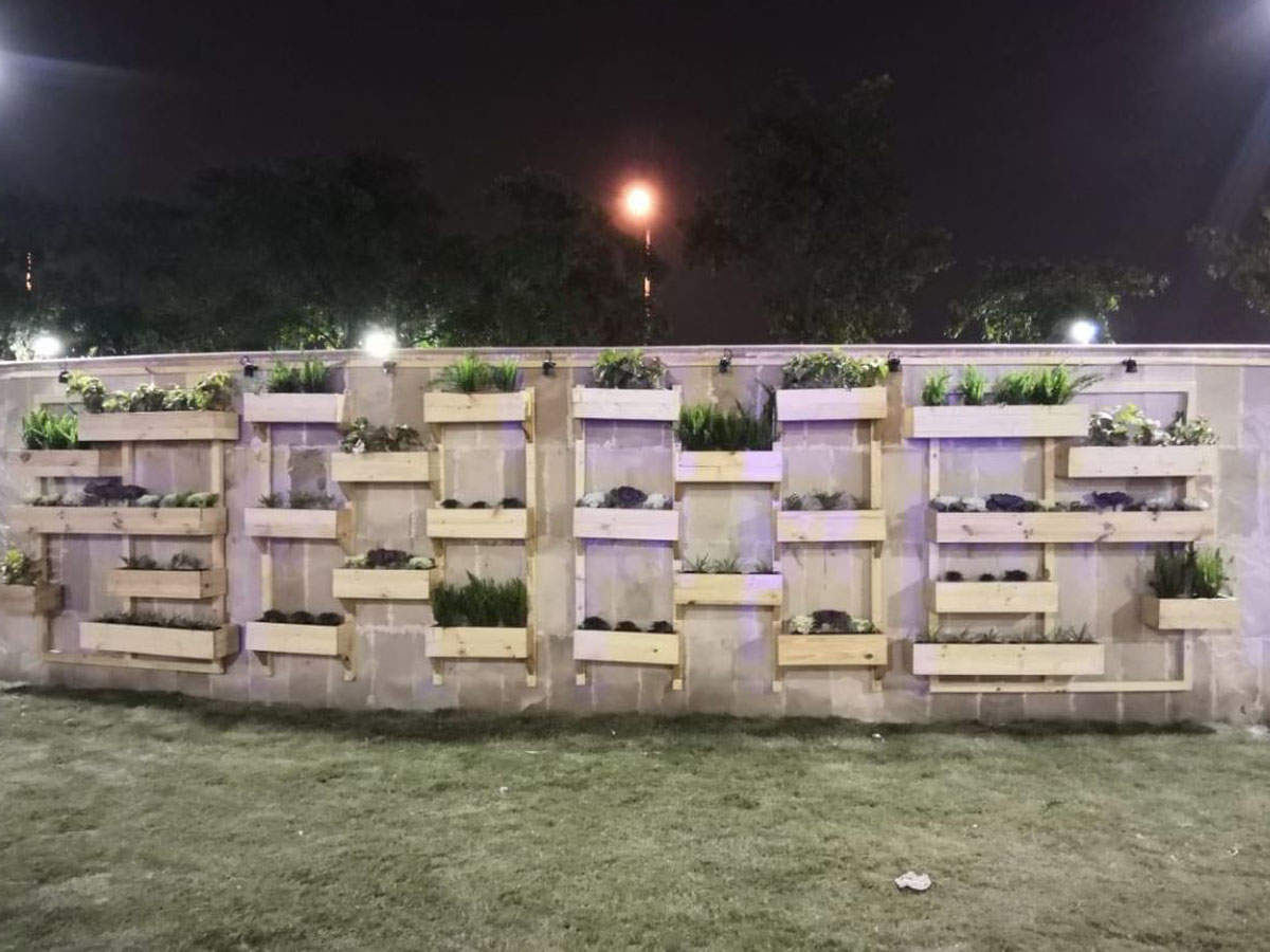 Noida authority creates artefacts from waste, discarded products such as wooden pellets, cargo packaging material for gazebo huts, mock well and planters, show pieces such as a tree structure as well as planters from waste tyres.