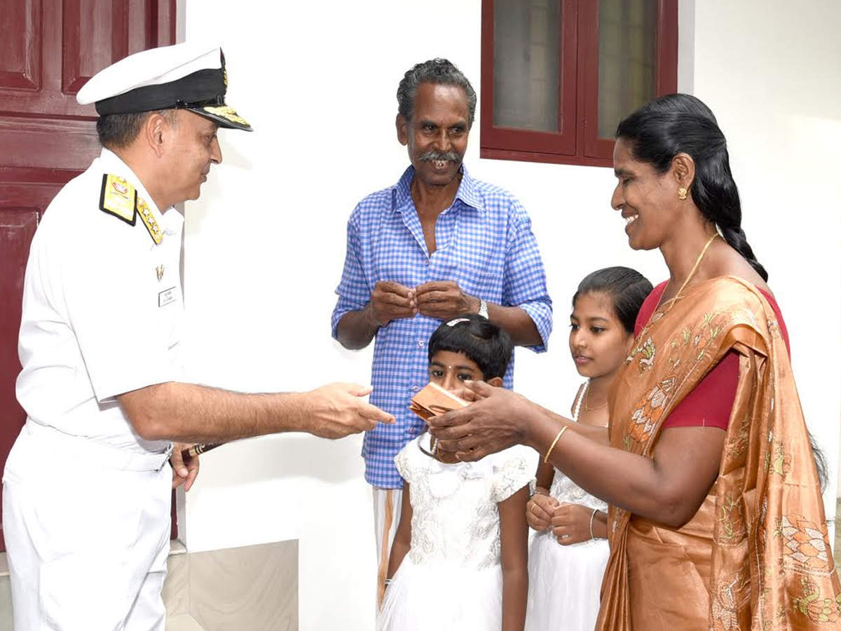 Vice Admiral Anil Kumar Chawla handed over the keys of a newly constructed house to Babu VK 