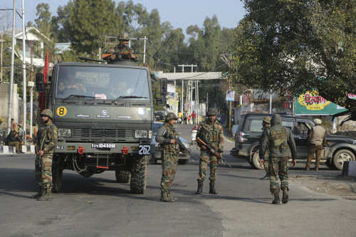 Armymen conduct a flag march during a curfew in Jammu (AP)