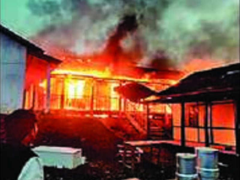 A building set on fire after a mob went on the rampage during the protest in Itanagar