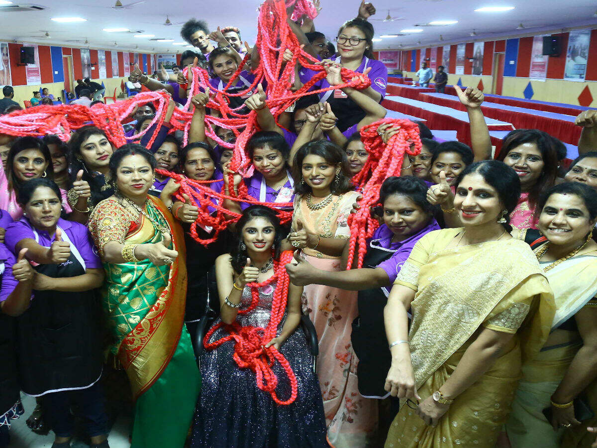 A record attempt on longest hair extension | Chennai News - Times of India A record attempt on longest hair extension | Chennai News - Times of India