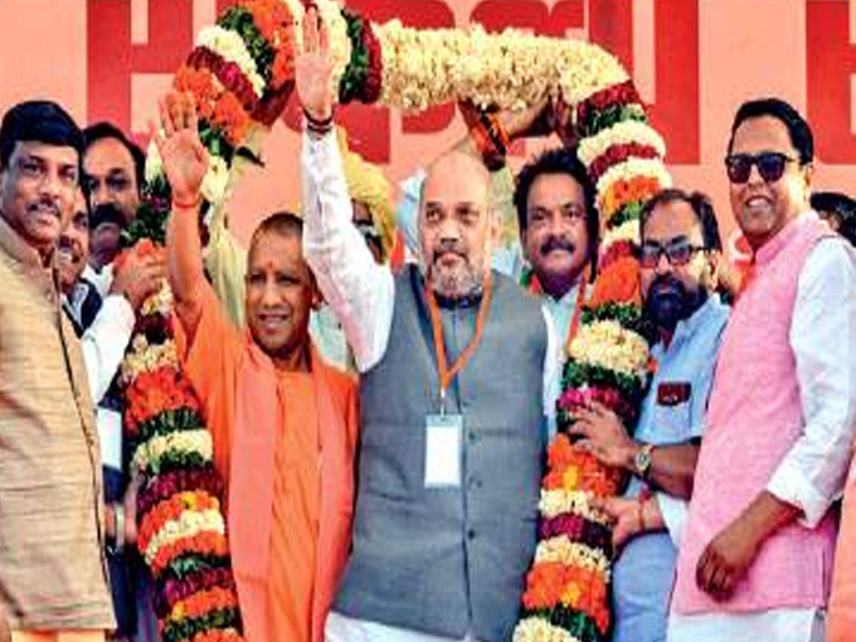  BJP chief Amit Shah with UP chief minister Yogi Adityanath during an election rally in Agra on Sunday