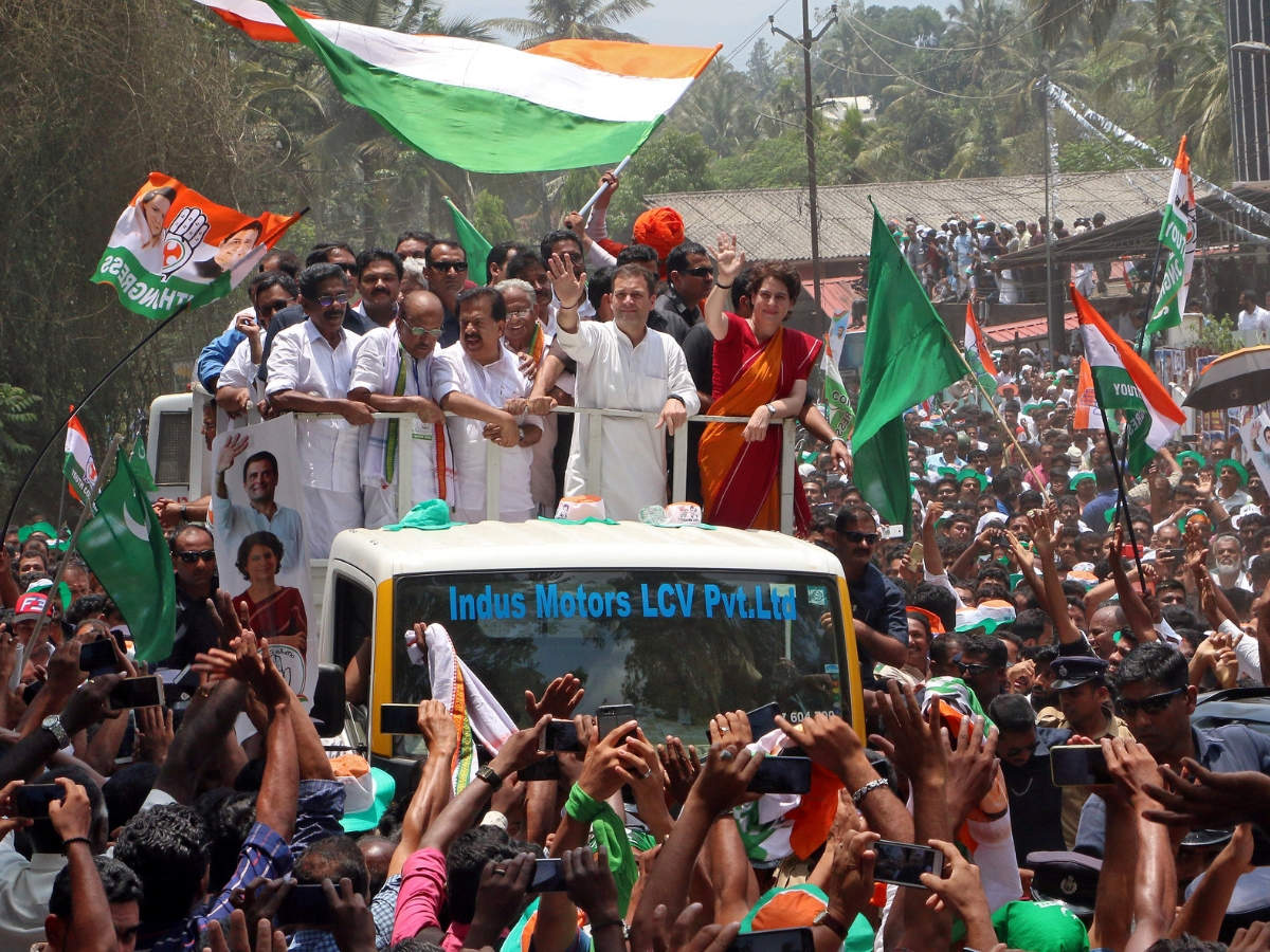 Rahul Gandhi with his sister Priyanka Gandhi Vadra, wave to their supporters after Rahul filed his nomination papers for the general election, in Wayanad. (Photo: Reuters)