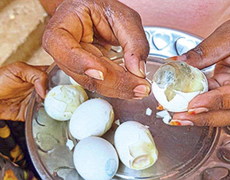 Vigilance officials found rotten eggs being served to students during a surprise raid on Monday
