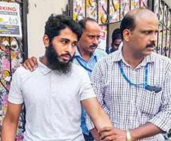 NIA detain people after conducting searches at two places in connection with an IS module case, in Hyderabad