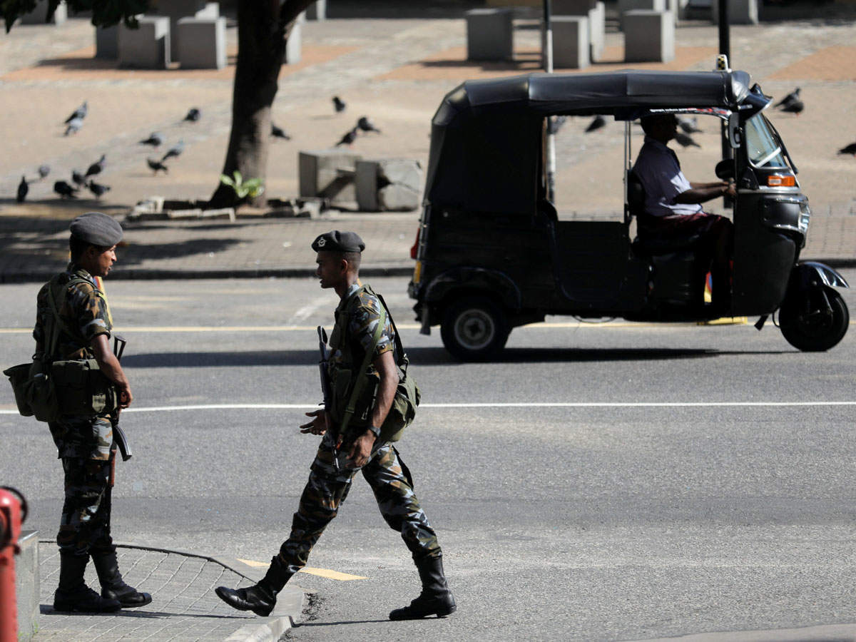 Security officers guard the road to the presidentâÄÖs house in Colombo, after bomb blasts ripped through churches and luxury hotels on Easter, in Sri Lanka on April 22, 2019. (Reuters photo)