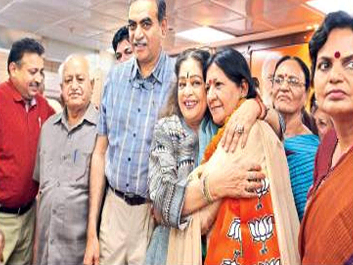 BJP candidate Kirron Kher welcomes Poonam Sharma into the party