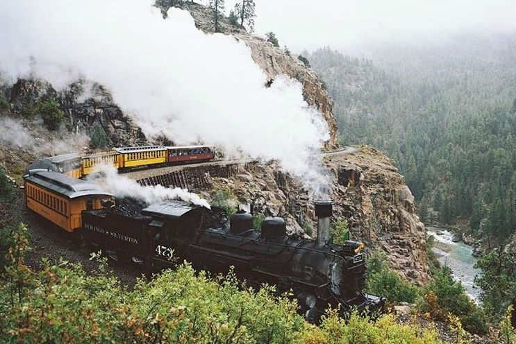 Chug beer and ride a train through the mountains of Colorado