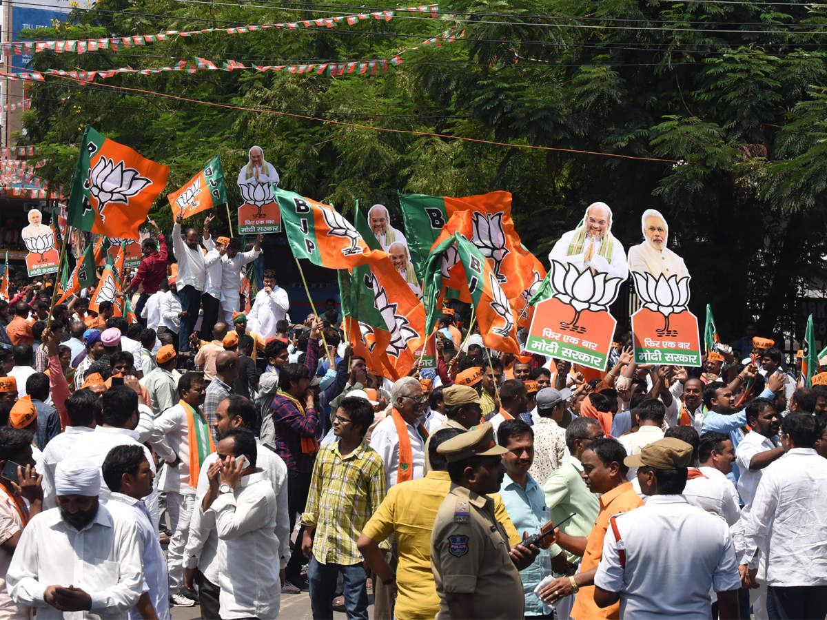 BJP workers outside party office in Hyderabad on Friday.