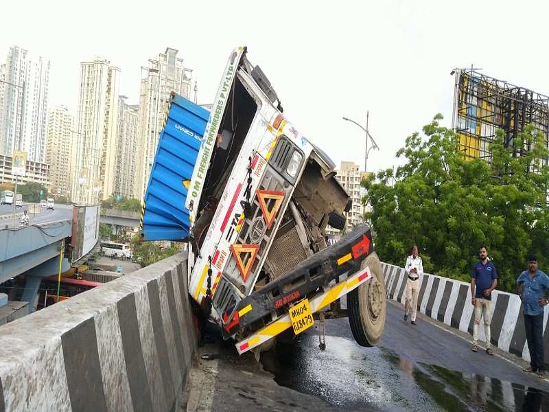 Thane: Traffic affected as container topples on Majiwada flyover