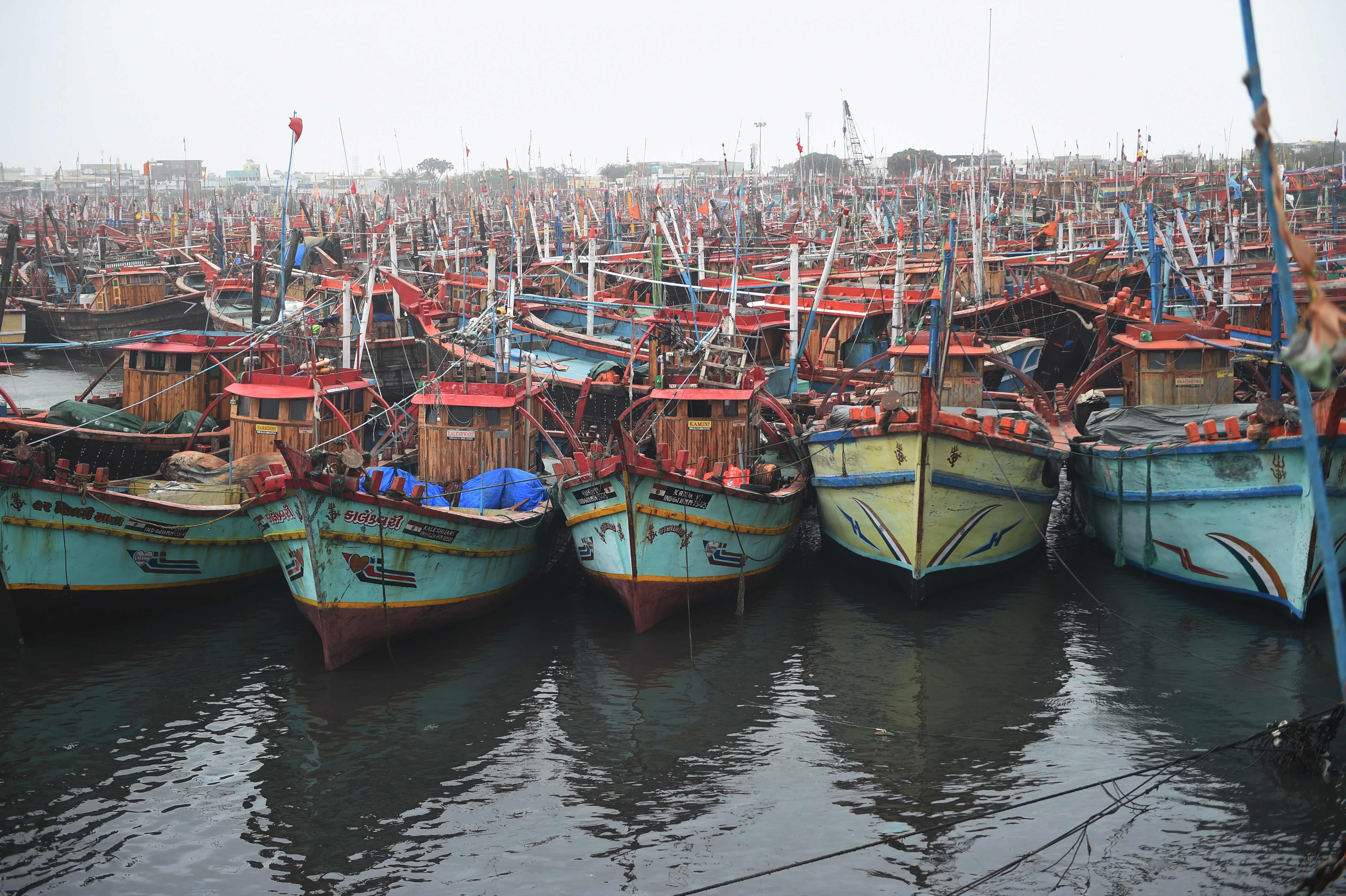 Fishing boats are seen moored as a part of precautionary measure Veraval Port in Gujarat. (AFP photo)