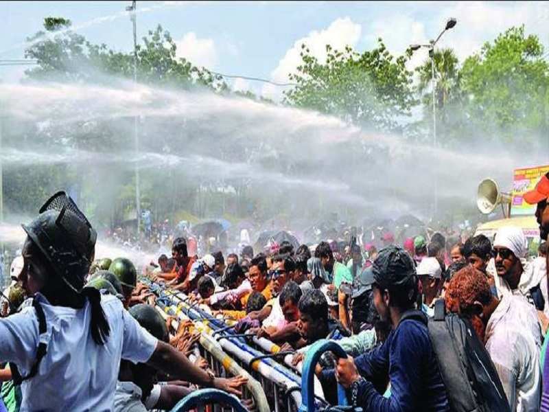 Police charge water cannons to disperse the protesters in the Esplanade area