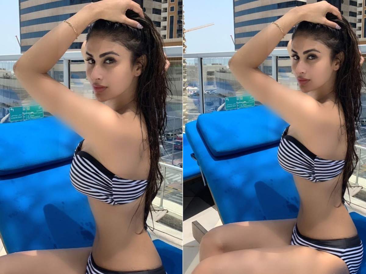 Mouni Roy heats up Dubai with her strapless bikini - Times of India