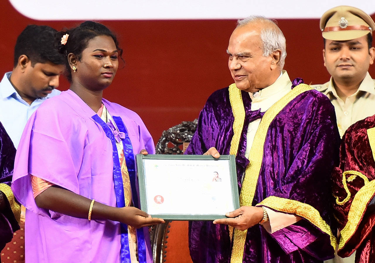 Rakshika Raj receives her certificate from Tamil Nadu governor Banwarilal Purohit in Chennai on Saturday (TOI photo by C Suresh Kumar) 