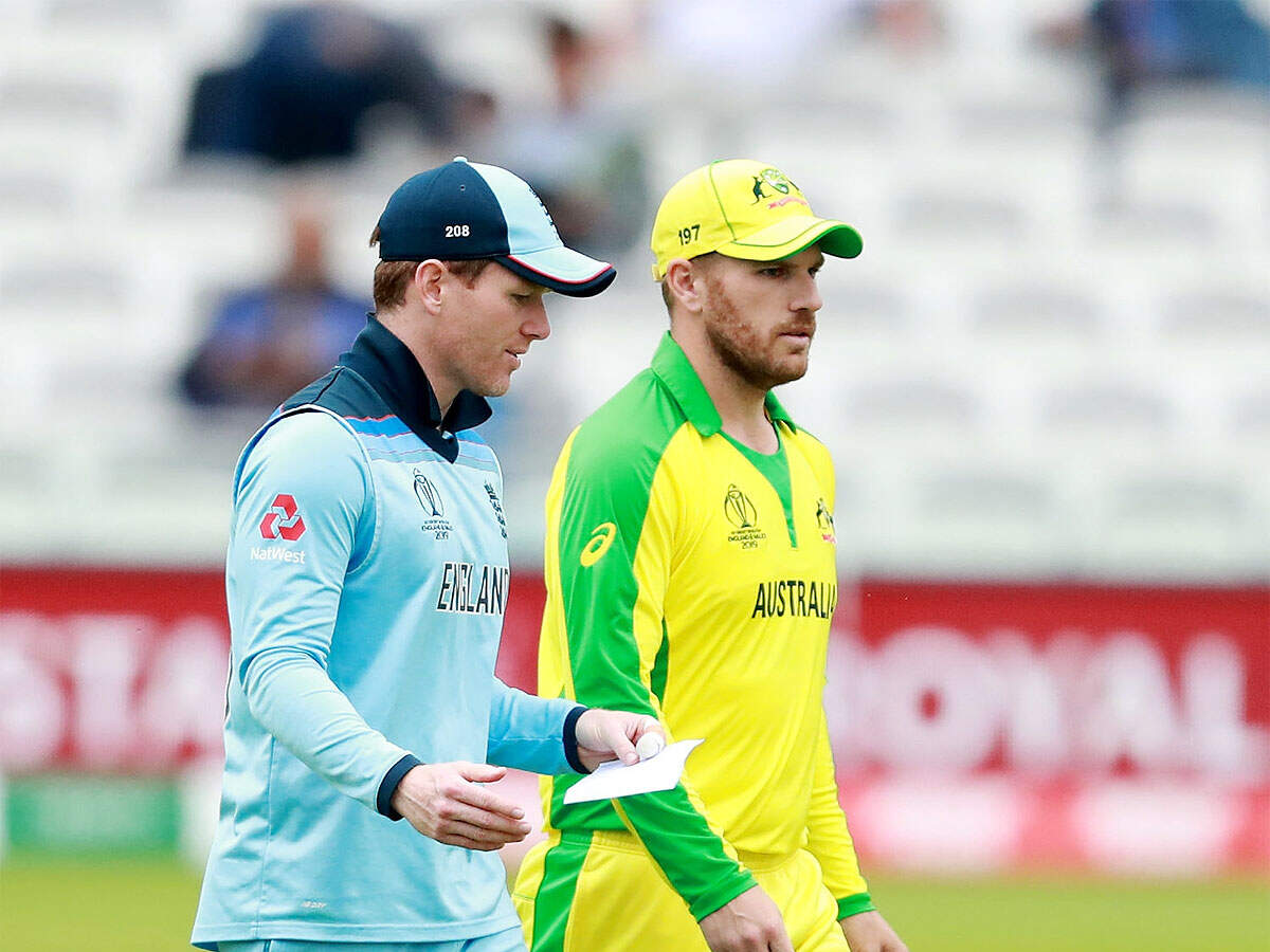 Eoin Mogan and Aaron Finch. (Getty Images)