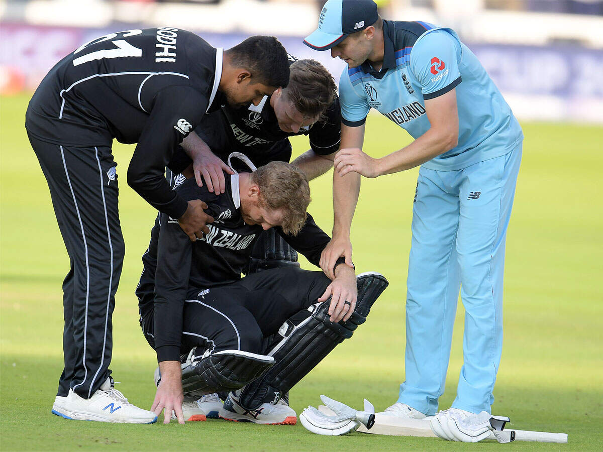 Martin Guptill is assisted by teammates and Chris Woakes after the World Cup final at Lord's. (AFP Photo)