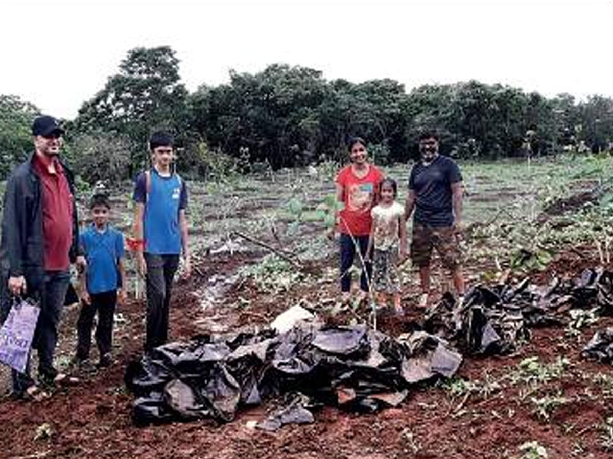 Abha Bhagwat along with three others and three kids collected about 300 large waste plastic bags in two hours, despite the pouring rain
