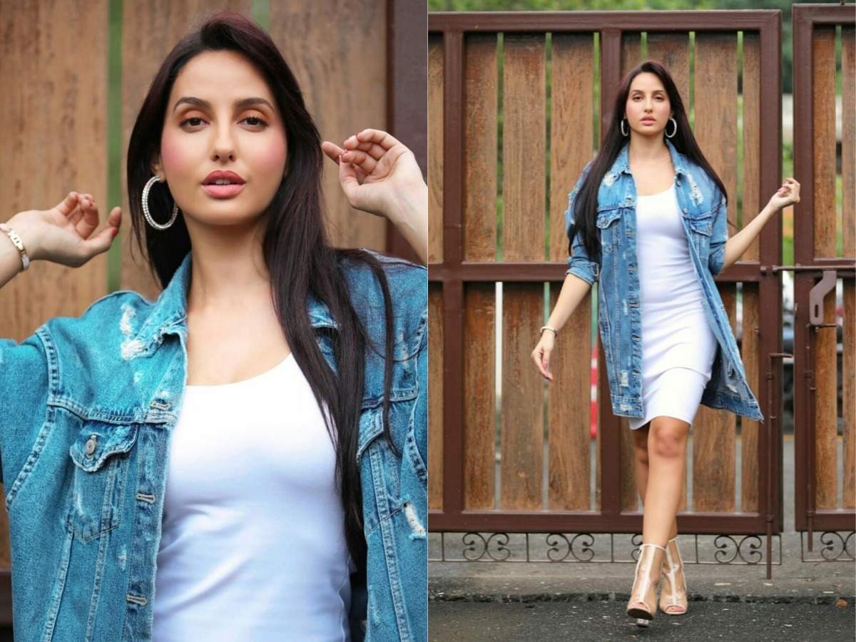 Nora Fatehi shows us how to rock the long denim jacket look! 