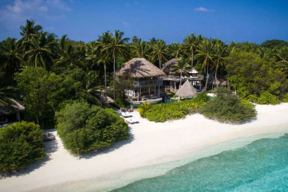Travel job alert—a luxury resort in the Maldives is looking for a Barefoot Bookseller