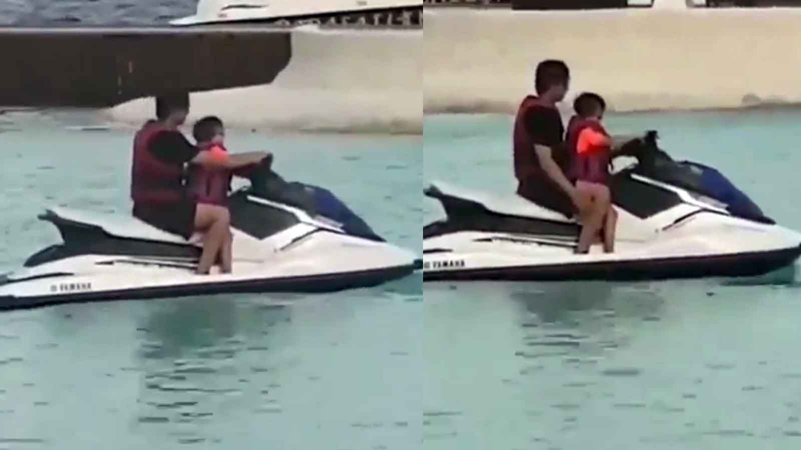 Image result for A video of Shah Rukh Khan taking AbRam jet-skiing from their Maldives vacation is going viral on the internet.