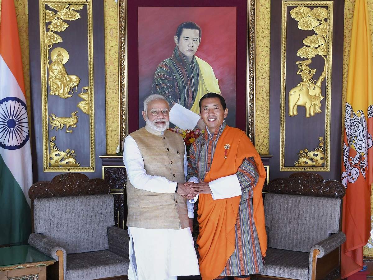 Prime Minister Narendra Modi and his Bhutan counterpart Lotay Tshering in Thimphu Bhutan, on Saturday. 