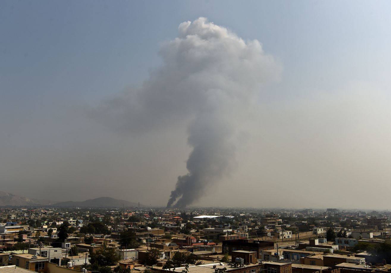 Smoke rises from the site of an attack after a massive explosion the night before near the Green Village in Kabul on September 3, 2019. (AFP photo)