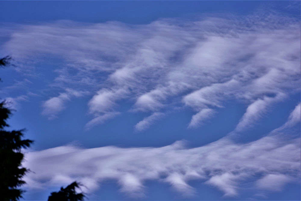 Kelvin-Helmholtz, the clouds that look like beautiful breaking sea waves